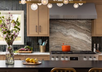 Twist on mid century modern kitchen with luxury level appliances